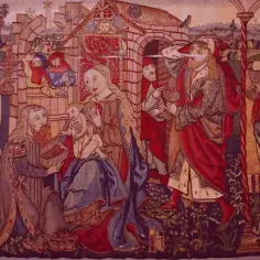 Scena biblijna z adoracją Dzieciątka Jezus, bogato zdobiony gobelin, który może symbolizować koniec średniowiecza.