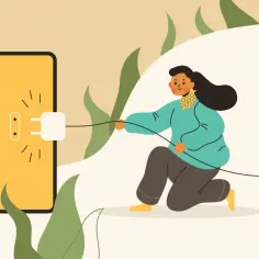 Kobieta podłącza wtyczkę do gniazdka na ekranie telefonu, symbolizując naukę, jak obliczyć zużycie prądu.