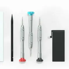 Narzędzia do wymiany baterii iPhone 6s: organizer na śrubki, śrubokręty, pęseta, kostka.
