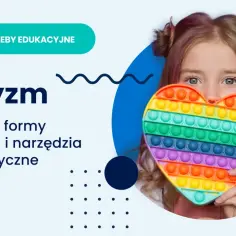 Dziewczynka z autyzmem trzyma tęczowe serce typu pop it. Temat: Autyzm, potrzeby, wsparcie i narzędzia terapeutyczne.