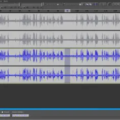 Edycja dźwięku w programie Audacity po polsku: cztery ścieżki audio z falami dźwiękowymi, dwie szare, dwie niebieskie.