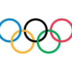 Pięć przeplatających się kół olimpijskich: niebieskie, żółte, czarne, zielone i czerwone, symbolizujące jedność i sportową rywalizację.