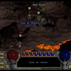 W grze diablo online bohaterka walczy z demonem nad lawą. Zdobycz to "Ring of Power".