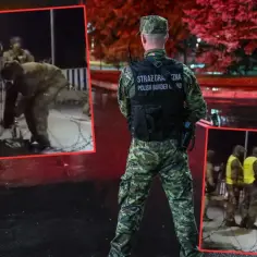 Strażnik graniczny czuwa nad sytuacją na granicy z Białorusią. Widać montaż bariery z drutem kolczastym.