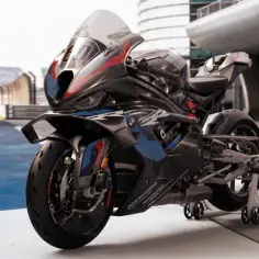 Czarny, sportowy motocykl BMW M 1000 RR, najszybszy ścigacz na świecie, gotowy do wyścigu na torze.