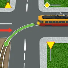 Na skrzyżowaniu, kiedy tramwaj ma pierwszeństwo, niebieski samochód musi ustąpić mu drogi, zgodnie z zieloną strzałką.