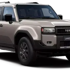 Nowy, masywny Toyota Land Cruiser w kolorze szampańskim, gotowy na każdą przygodę. Ten potężny toyota jeep to symbol niezawodności.