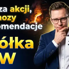 Analiza akcji, prognozy i rekomendacje dla spółki JSW. Mężczyzna w garniturze trzyma kartkę z logo JSW.