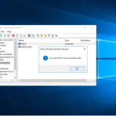 Okno "Active Directory Users and Computers" z komunikatem "Account HACK was successfully reset". To może być sygnał, że ktoś próbował uzyskać backdoor.