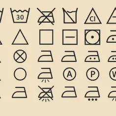 Zestaw symboli na suszarce bębnowej: pranie, wybielanie, suszenie, prasowanie.