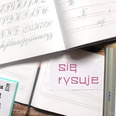 Ćwiczenia kaligrafii, litery i cyfry. Na kartce napis "się rysuje".