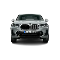 Szare BMW X4 z charakterystycznym grillem i ostrymi światłami. Sprawdź aktualną bmw x4 cena i konfigurację.