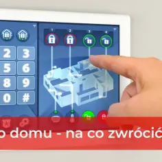 Palec dotyka ekranu panelu sterowania alarmem domowym, pokazując ranking najlepszych systemów alarmowych do domu ranking bezprzewodowych zestawów.