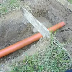 Jak podłączyć rurę do szamba - uniknij najczęstszych błędów i problemów