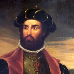 Portret Vasco da Gamy w stroju z epoki, z widocznym krzyżem na łańcuchu.