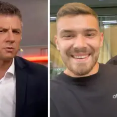 Mateusz Borek z synem, uśmiechnięty młody mężczyzna w czarnej koszulce i jego ojciec w garniturze.