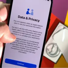 Dłoń trzyma iPhone'a z ekranem "Data & Privacy". To ważna informacja o ochronie danych, która może zawierać ukryte wiadomości iPhone.