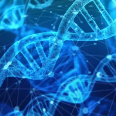 Błękitne, świetliste struktury DNA wirują w przestrzeni, tworząc sieć połączeń. To wizualizacja, która może pomóc zrozumieć, scjentyzm co to jest – nauka jako klucz do poznania świata.