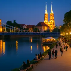Wieczorny spacer po Ostrowie Tumskim we Wrocławiu, z widokiem na oświetlone mosty i katedrę. Idealne miejsce, by zobaczyć Wrocław wieczorem.