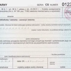 Formularz mandatu karnego z numerem 0123456. Wypełniony formularz dokumentuje nałożenie mandatu karnego.