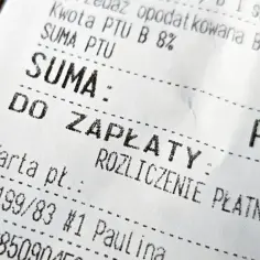 Paragon z nipem, widoczna kwota do zapłaty i rozliczenie płatności kartą.
