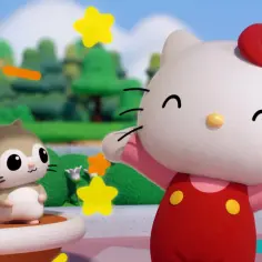 Wesoły kot z bajki, Hello Kitty, bawi się z małym chomikiem wśród spadających gwiazdek.