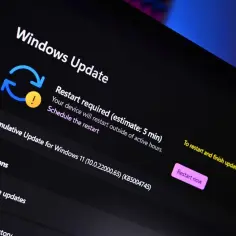 Ekran Windows Update informuje o konieczności restartu komputera po aktualizacji do Windows 11.