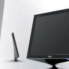 Dwa monitory LG, jeden większy z przodu, drugi mniejszy w tle. Nie wiadomo, ile cali ma monitor, ale oba wyglądają nowocześnie.