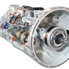 Przekrój skrzyni biegów pokazujący, jak wygląda sprzęgło hydrokinetyczne z elementami hydraulicznymi i przekładniami.
