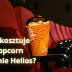 Cennik Popcorn Helios: ile kosztuje przekąska w kinie? Pudełko popcornu z okularami 3D na tle czerwonych foteli kinowych.
