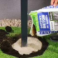Jaki beton do słupków ogrodzeniowych zapewni trwałość i stabilność?
