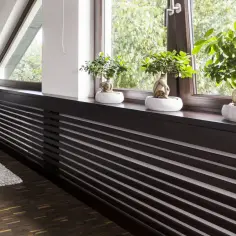 Zabudowany kaloryfer - elegancka zabudowa grzejnika z półkami
