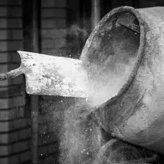 Kto wynalazł cement? Odkryj fascynującą historię i znaczenie
