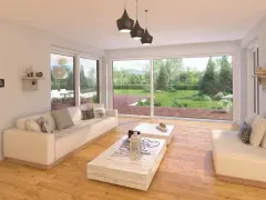 Nowoczesny salon z dużymi oknami wychodzącymi na ogród.