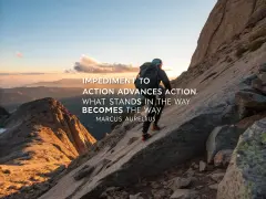 A climber ascends a rocky mountain, proving the obstacle is the path. Sunset paints the sky.
