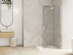 Salle de bain moderne avec douche à l'italienne. Le nettoyage de vitre douche est facilité par le design épuré.