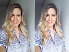 Uśmiechnięta blondynka w pasiastym, rozpiętym kołnierzyku robi sobie selfie.
