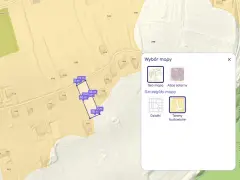 Mapa z zaznaczonymi wymiarami i polem działki, obok okno wyboru mapy z opcjami "Geo mapa", "Atlas solarny", "Działki" i "Tereny budowlane".