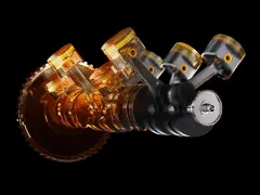 Motore V4 trasparente con pistoni dorati e albero motore. Il movimento dei pistoni è fondamentale per il calcolo della coppia.