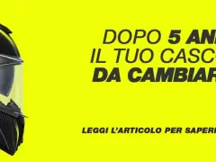 Casco da moto in carbonio con grafica gialla, con testo che chiede se il casco è da cambiare dopo 5 anni, rispettando l'e11 omologazione.