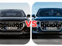 Dwa Audi Q7, czarne i niebieskie, z napisem VS pośrodku.