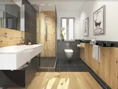 Salle de bain moderne avec murs en bois chaleureux, douche à l'italienne, lavabo suspendu et WC. L'ambiance naturelle du bois pour salle de bain invite à la détente.