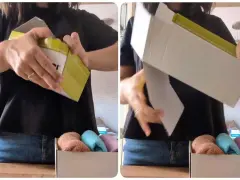 Come sistemare le scarpe con le scatole: una persona apre una scatola, rivelando un interno organizzato con calzini piegati.