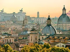 A breathtaking panorama of Rome's domes and rooftops at sunset, capturing the essence of Rome in one day.