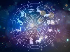 Zodiakalny koziorożec, symbolizujący okres od 22 grudnia do 19 stycznia, widnieje na tle gwiezdnej tarczy horoskopu.