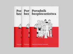 Poradnik bezpieczeństwa z rysunkami ludzi i psa. Uczy, jak udzielić pierwszej pomocy, w tym resuscytacji.