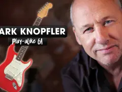 Mark Knopfler, einer der bekanntesten Gitarristen, mit seiner roten Fender Stratocaster.