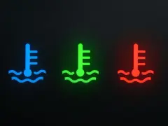 Icone di un termometro in acqua, blu, verde e rosso, che indicano la temperatura del liquido di raffreddamento.