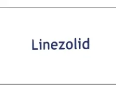 Niebieski napis "Linezolid" na białym tle. Linezolid to antybiotyk.