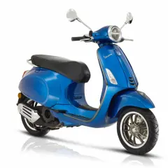 Vespa azul marino, lista para recorrer la ciudad con estilo.